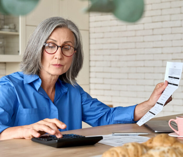 Adult senior 60s woman calculating paper documents at home at pc. Serious middle aged woman at table working on bank payments household online with computer technologies. SSUCv3H4sIAAAAAAAACpyRz27DIAzG75P2DhHnRmoakqZ7lWoH8ycNKoUKSKep6rvPQKg474Z/tj/7M8/Pj6YhDLzi5Kt5xghjpfXqg4OgrEG8323cSSOkq8nD9eO+BlKoYJ0CXUMGgS8GbhKhWbWO+JWSxAcIq5c+Tt8QhyAvqJHhWyKveM5xUxIpiR2YImRXMb+yxArK4v/qzI/v4gYu0vDftHBlxEktIRs551Jy/QnS3WprsAplK1cPy0HHgr5SujvFlblUbTYs6eyljdvVBBdXeG9OtLV3YDqeeEZNWfgC3mO5KLwaxPGT7a2aY2xIBjZVIvAnYtj1h5F2E91TSkfaj92wFeTfWxTqpHWKEMb8qkRtXcUNyMDZwKaJtXIaREsPw7E9HXtooZvHgVPK6Czw8K8/AAAA//8DAFzUk/SYAgAA